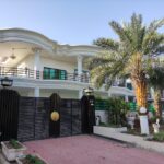 Main entrance of the building showcasing modern architecture and welcoming desig